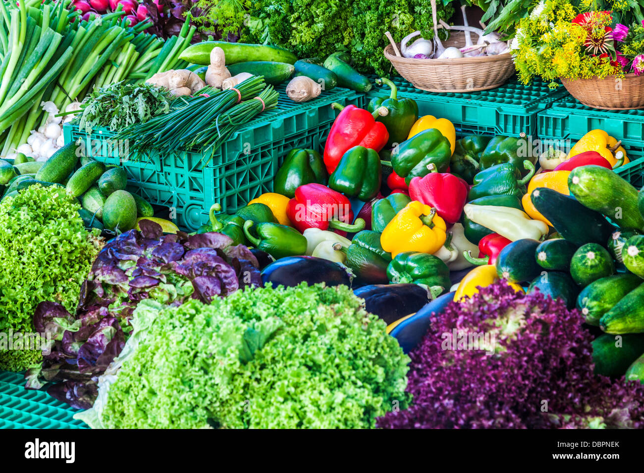 A colourful fresh produce stall selling Mediterranean salad vegetables at the market in the Place Guillaume II in Luxembourg. Stock Photo