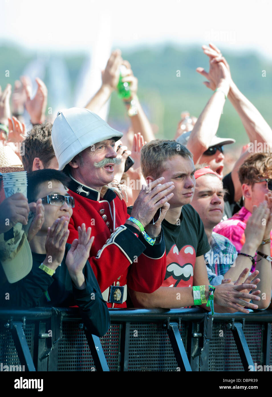Female fans on the crowd barrier of a concert Stock Photos and Images