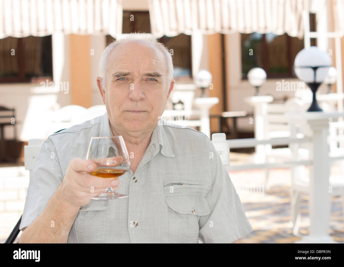 Man holding snifter hi-res stock photography and images - Alamy