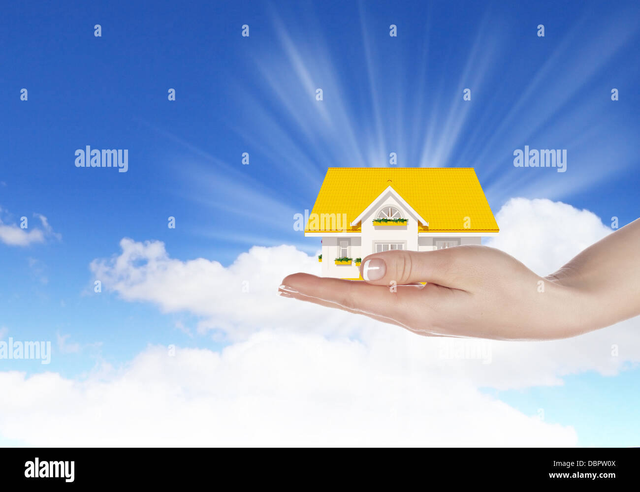 the house in hands on blue sky Stock Photo - Alamy