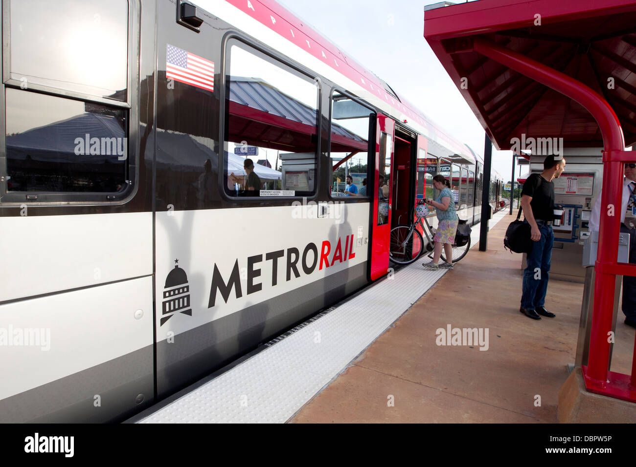 Morning commuters use public transportation Metro-Rail train as a newly ...