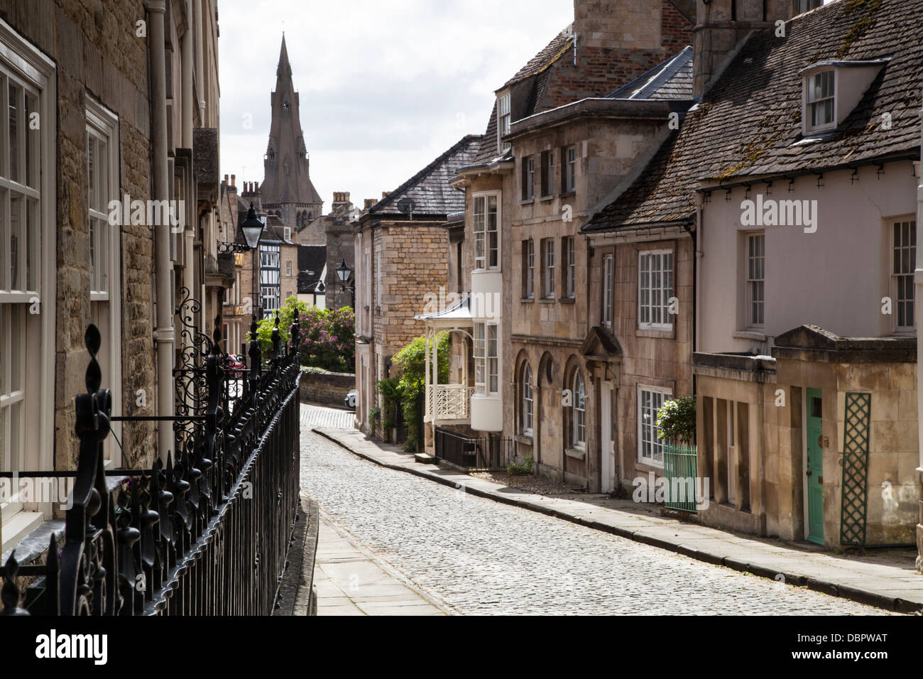 The quintessential cobbled street and Georgian architecture of Barn Hill with St Mary's church in the background, Stamford, Lincolnshire, England Stock Photo