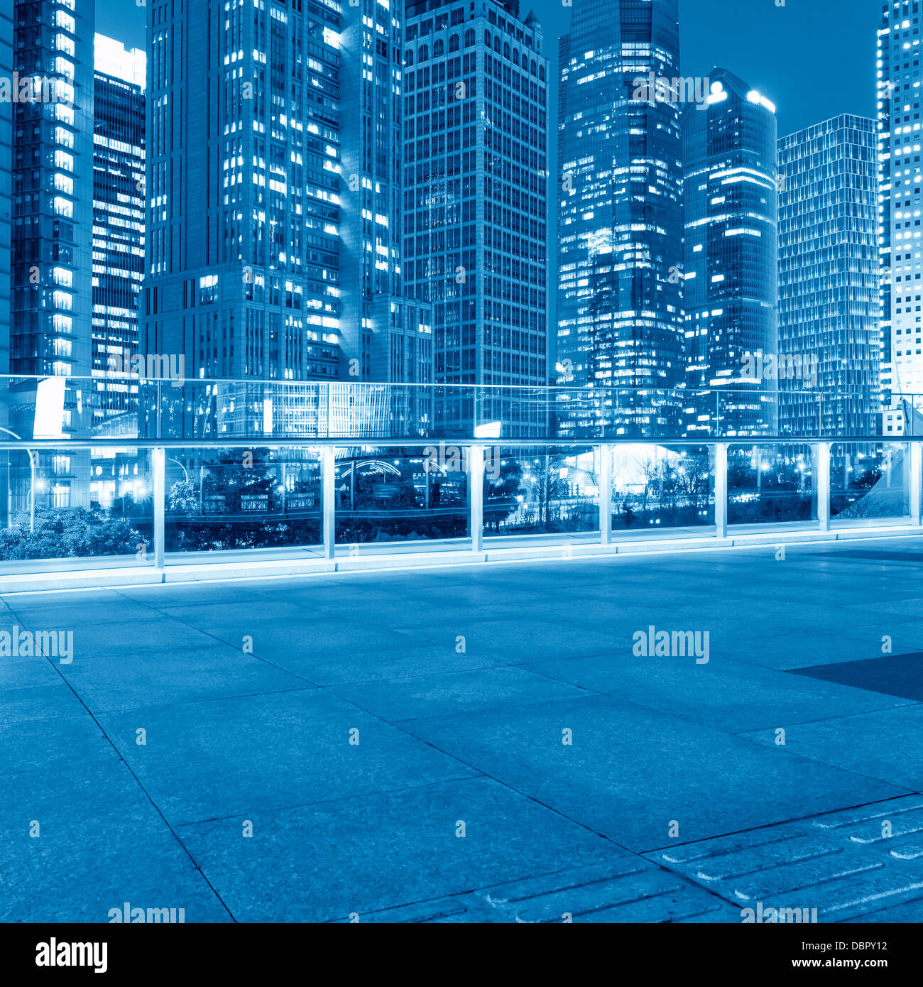 light trails on the street with modern building background in shanghai ...