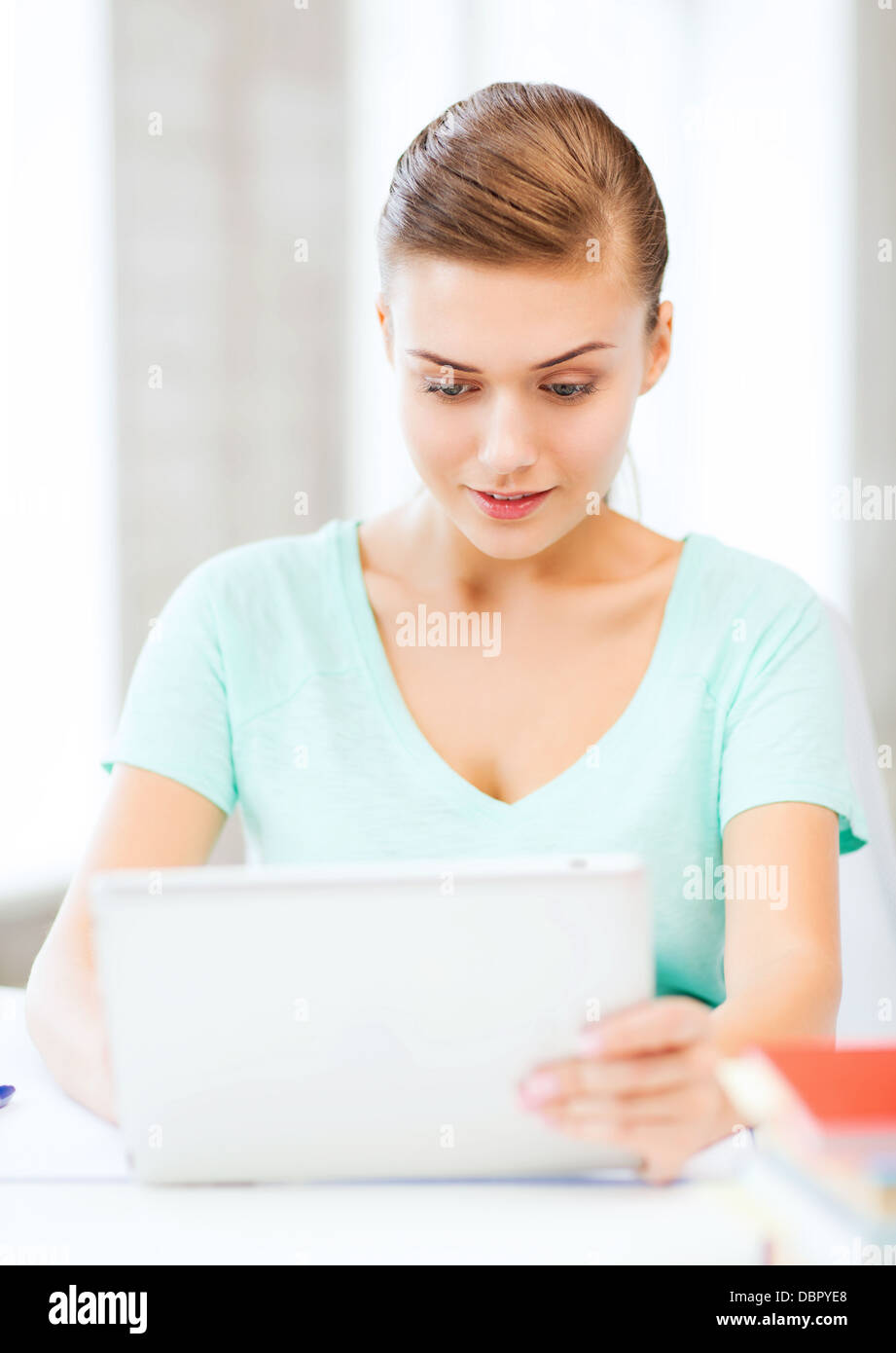 smiling student girl with tablet pc Stock Photo - Alamy