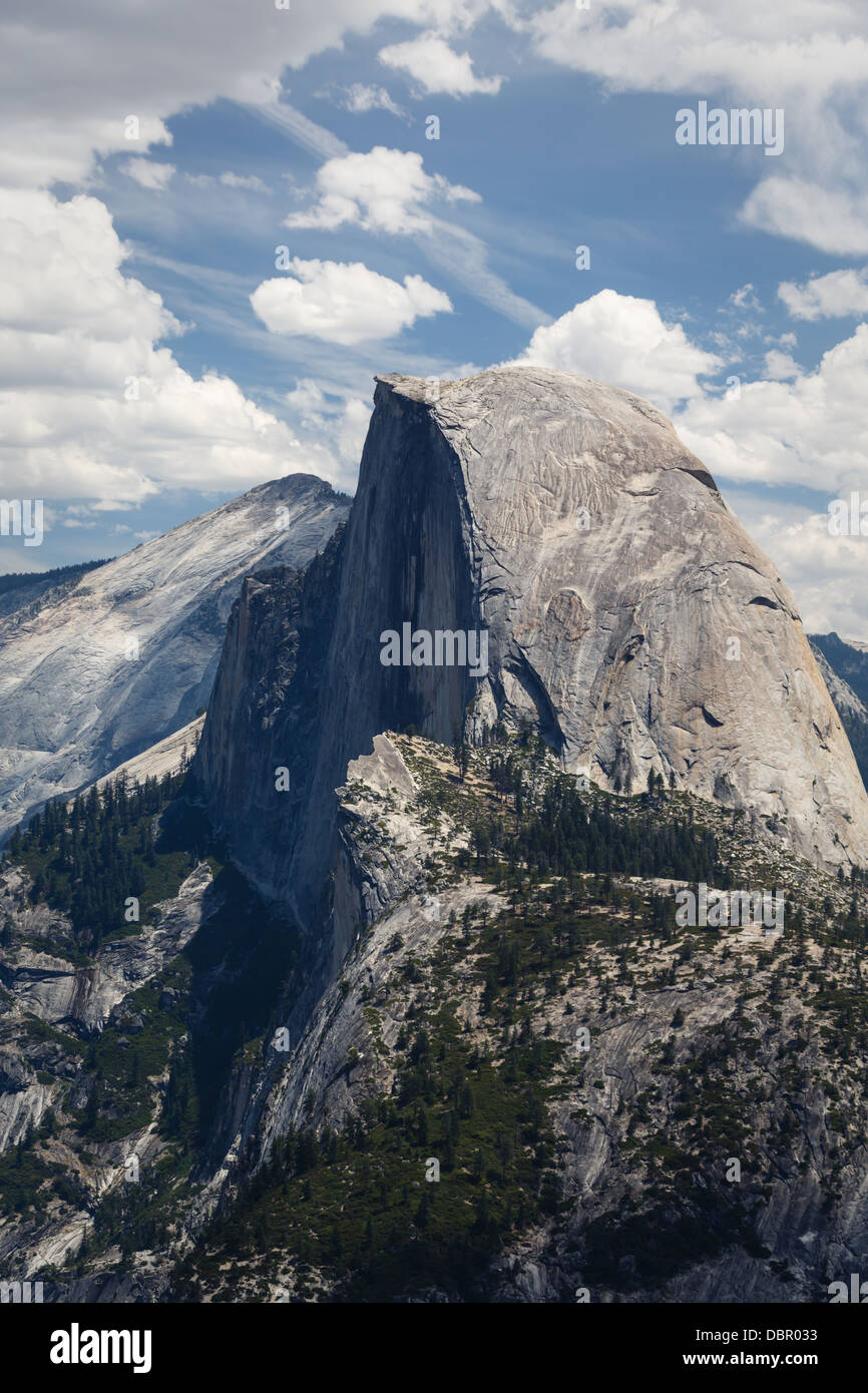 Close-up view of Half Dome mountain a favorite climbing spot for mountain climbers in Yosemite National and interesting clouds Stock Photo