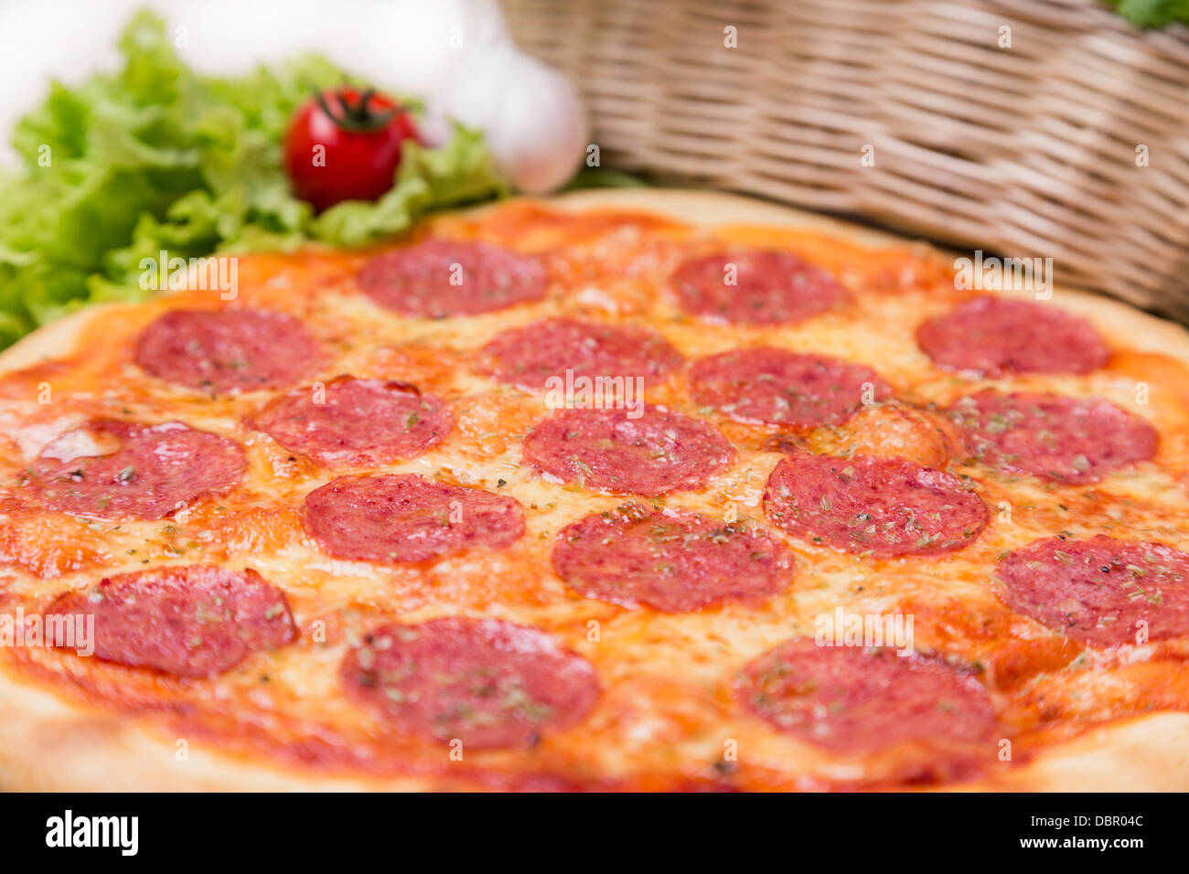 hot pizza with garnish and ingredients Stock Photo Alamy