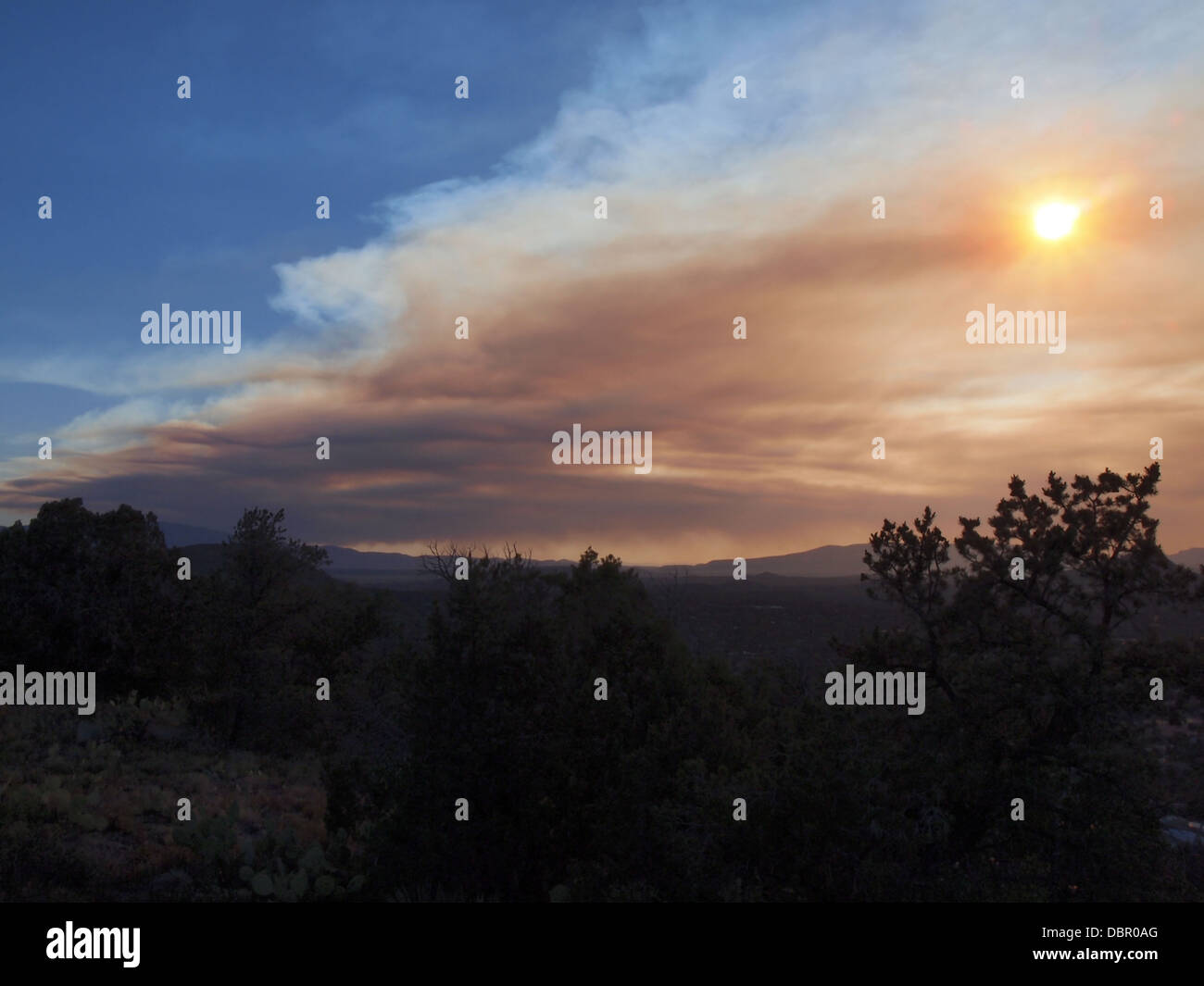 Sunset through smoke from a fire hi-res stock photography and images ...