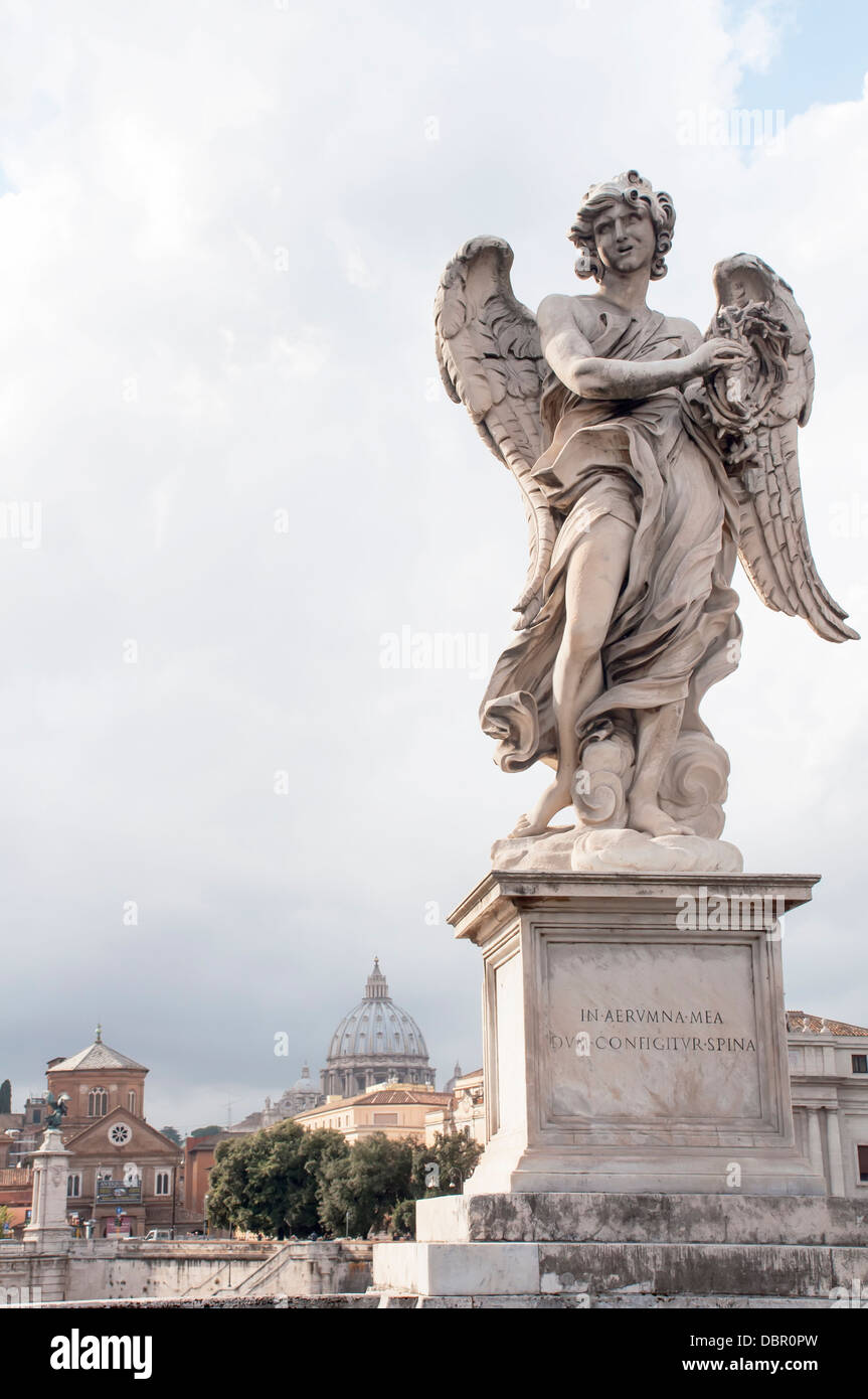 Famous statues San Angelo Bridge in the background with the Vatican in