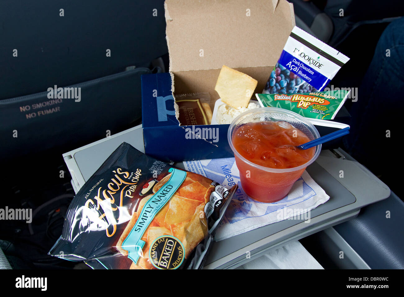 Airplane snack food on First Class flight Stock Photo - Alamy