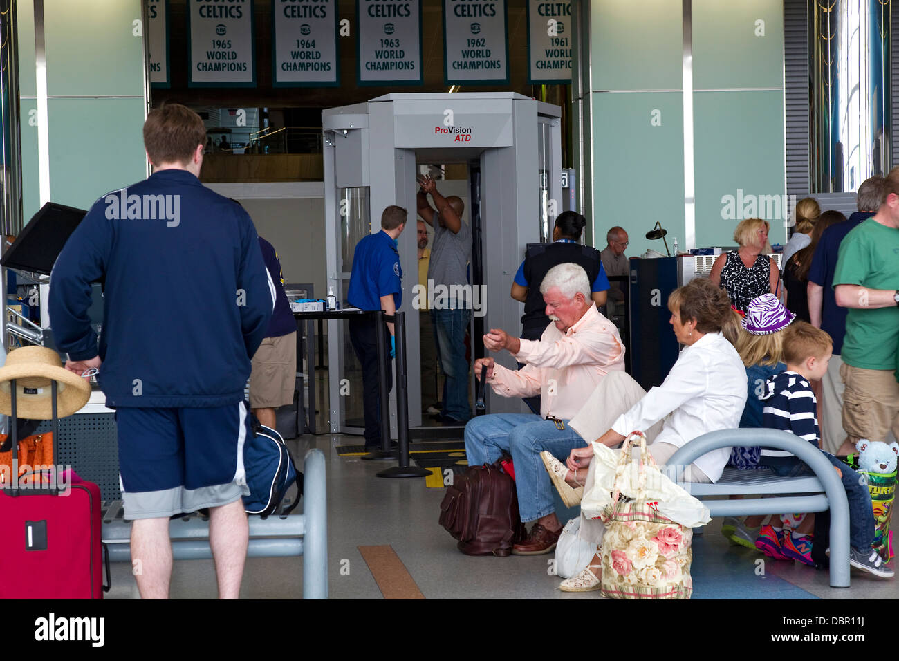 Passengers go through TSA, security checkpoint screening at Boston