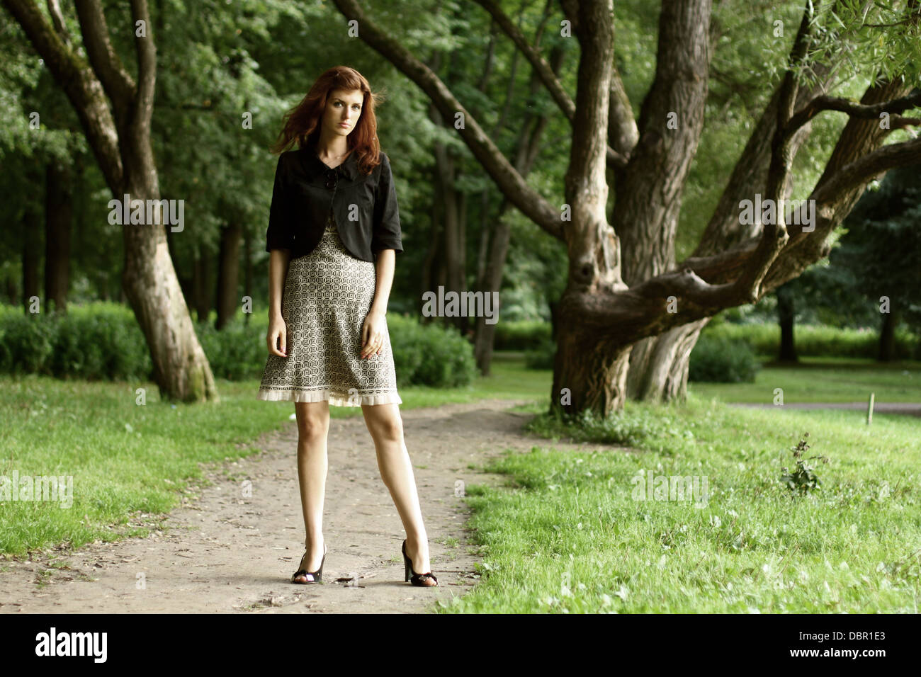 beautiful woman in summer park Stock Photo - Alamy