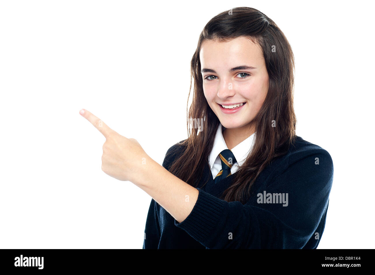 Active young girl showing the direction Stock Photo - Alamy