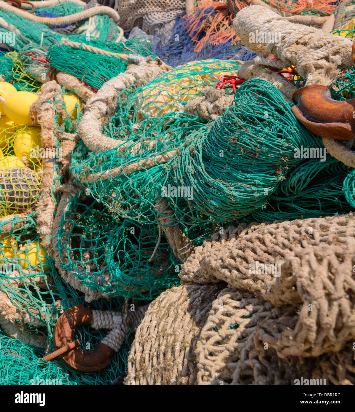 Colorful fisherman's nets with knots and nets closeup. Stock Photo