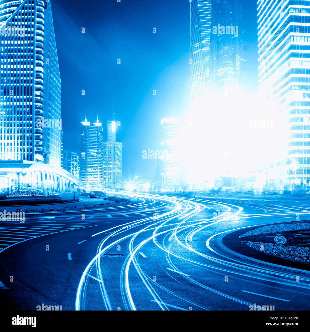 light trails on the street with modern building background in shanghai ...