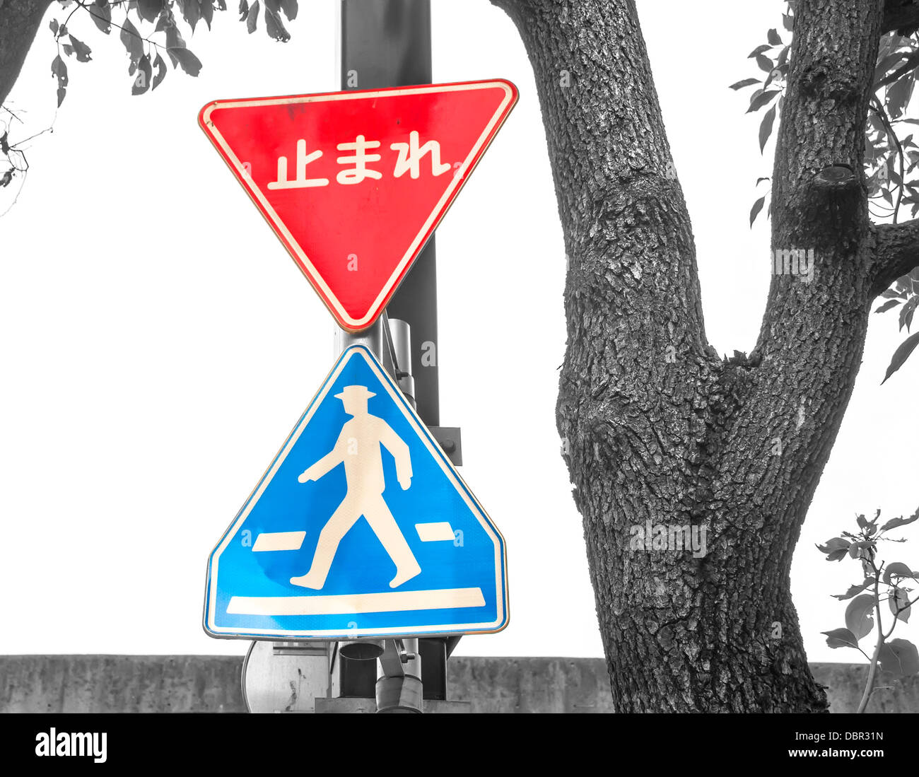 Japanese road sign with color signals and the rest of the black & white photography Stock Photo