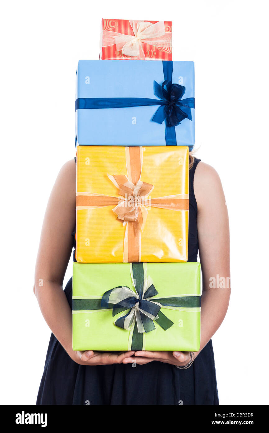 Woman holding many colorful presents, isolated on white background. Stock Photo