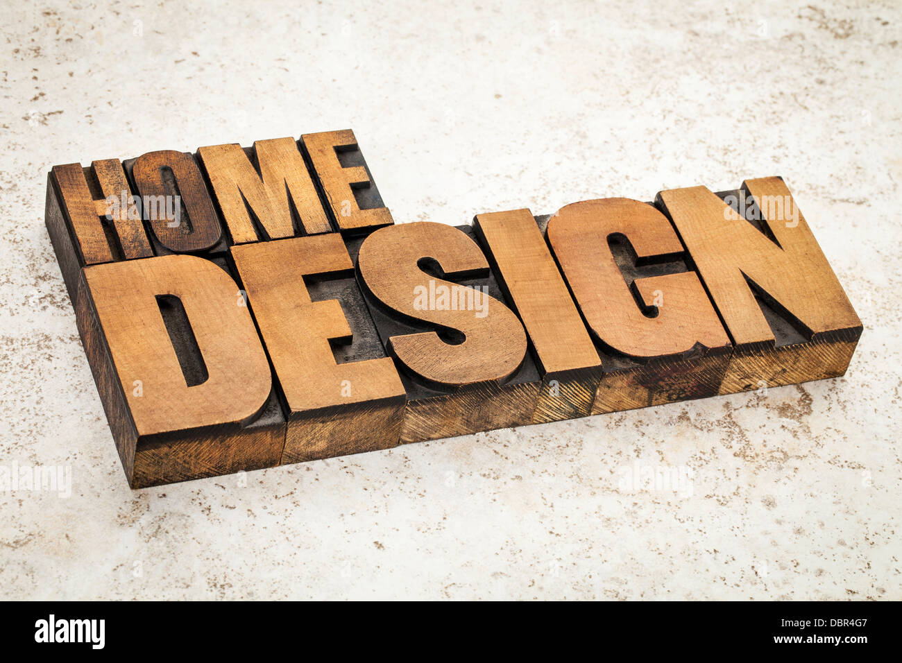 home design text in vintage letterpress wood type on a ceramic tile background Stock Photo