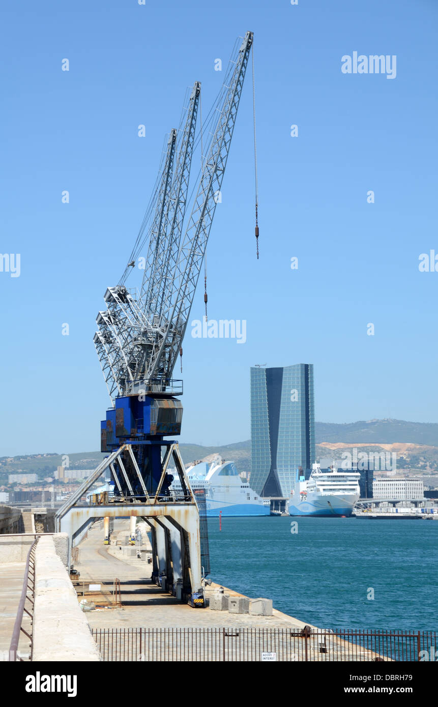 Sea Wall, Seawall, Break Water or Breakwater Wharf Docks Cranes and Harbour or Port & Zaha Hadid Tower Block on Waterfront Marseille France Stock Photo