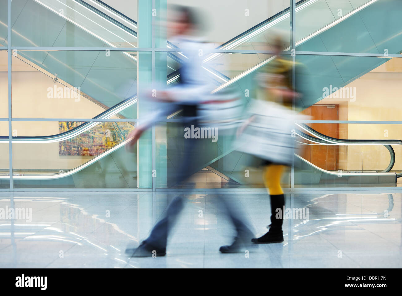 people rushing through corridor Stock Photo - Alamy