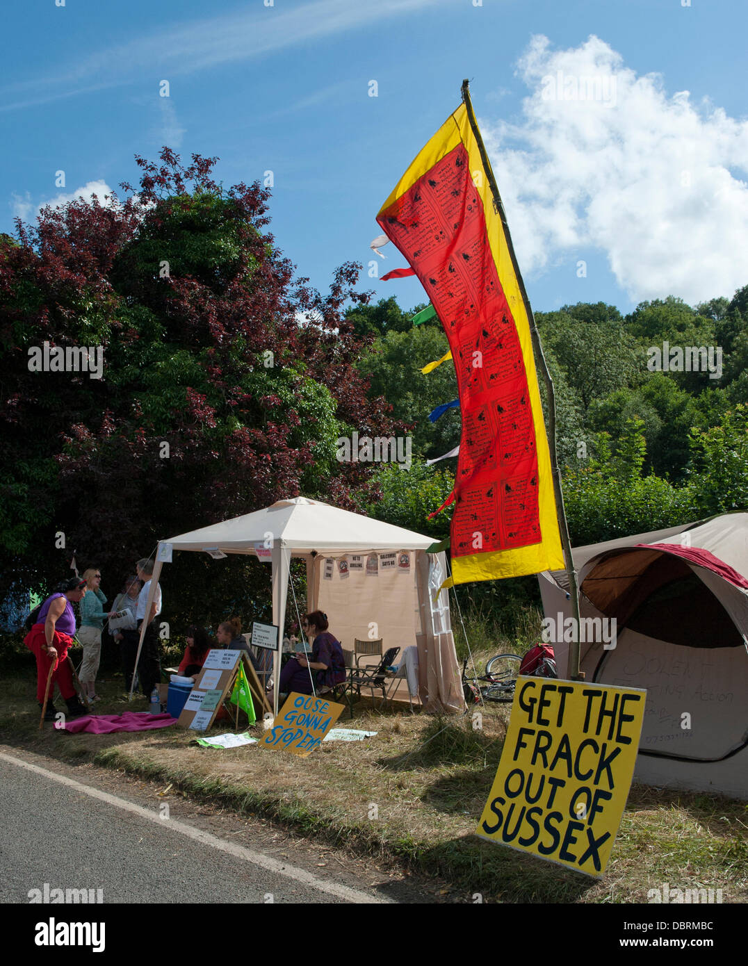 Balcombe, West Sussex, UK. 03rd Aug, 2013. Protesters and banner  against Fracking and Cuadrilla's exploratory drilling for oil and gas in Balcombe, Sussex, Credit:  Prixnews/Alamy Live News Stock Photo