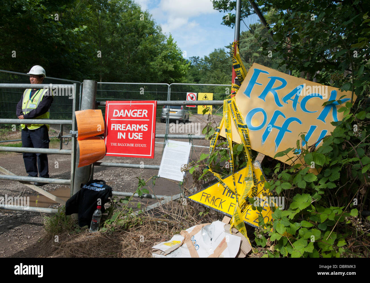 Balcombe, West Sussex, UK. 03rd Aug, 2013. 'Danger Firearms in use.The Balcombe Estate.' sign  at site entrance of Caudrilla's exploratory drilling for oil and gas in Balcombe, Sussex, Credit:  Prixnews/Alamy Live News Stock Photo