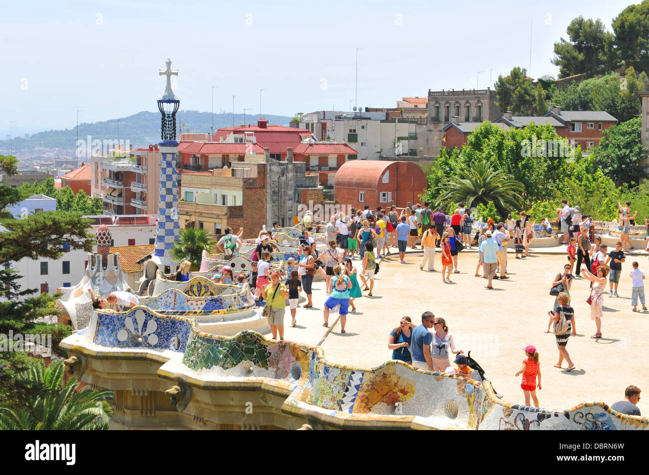 Barcelona, Spain: Tourists visiting the famous Park Guell, architectural landmark designed by the famous architect Antonio Gaudi Stock Photo