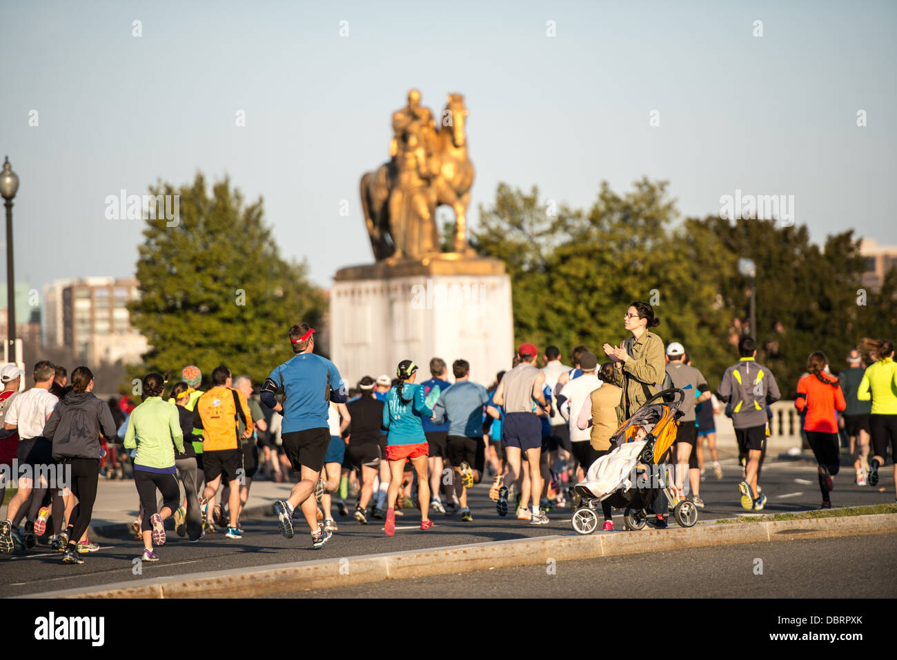 WASHINGTON DC, United States — Runners participate in the annual Cherry Blossom Ten Mile Run in Washington DC. The popular springtime race coincides with the National Cherry Blossom Festival, drawing thousands of competitors and spectators to the nation's capital. Stock Photo