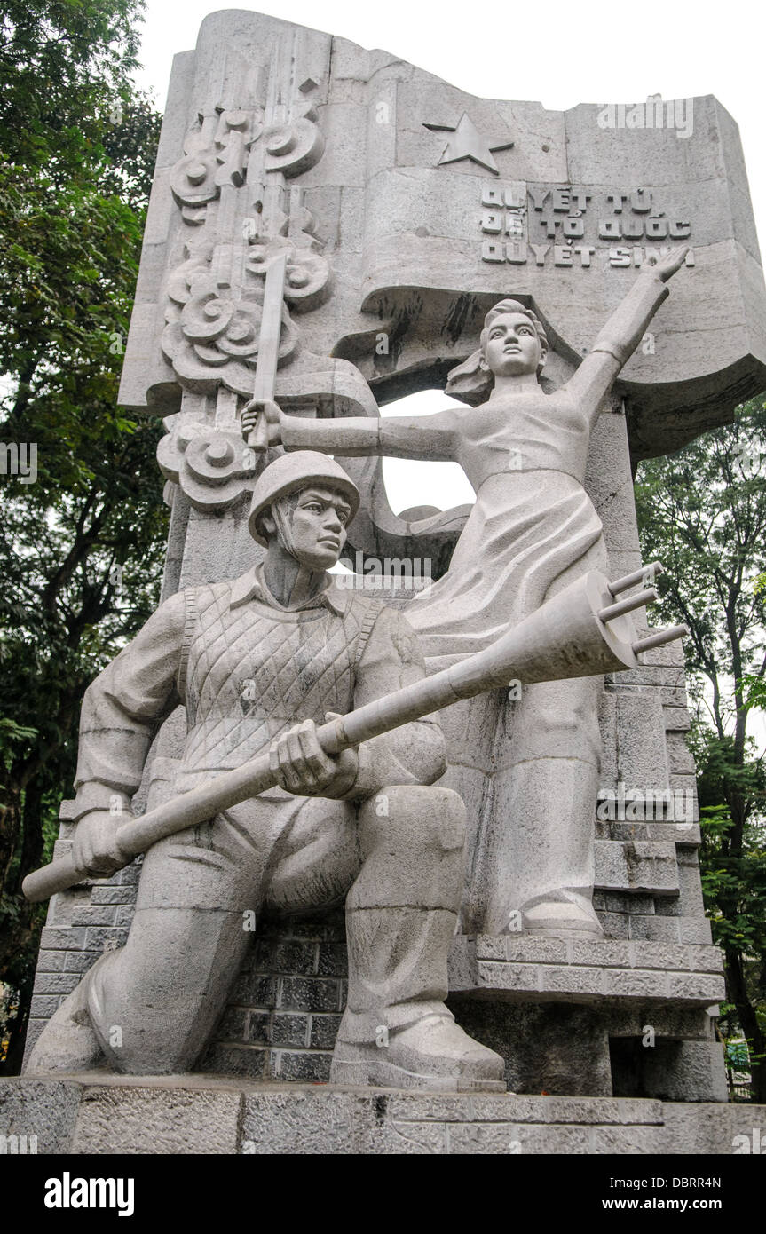 HANOI, Vietnam - A Communist-style stone statue celebrating Hanoi in the city's Old Quarter. Stock Photo