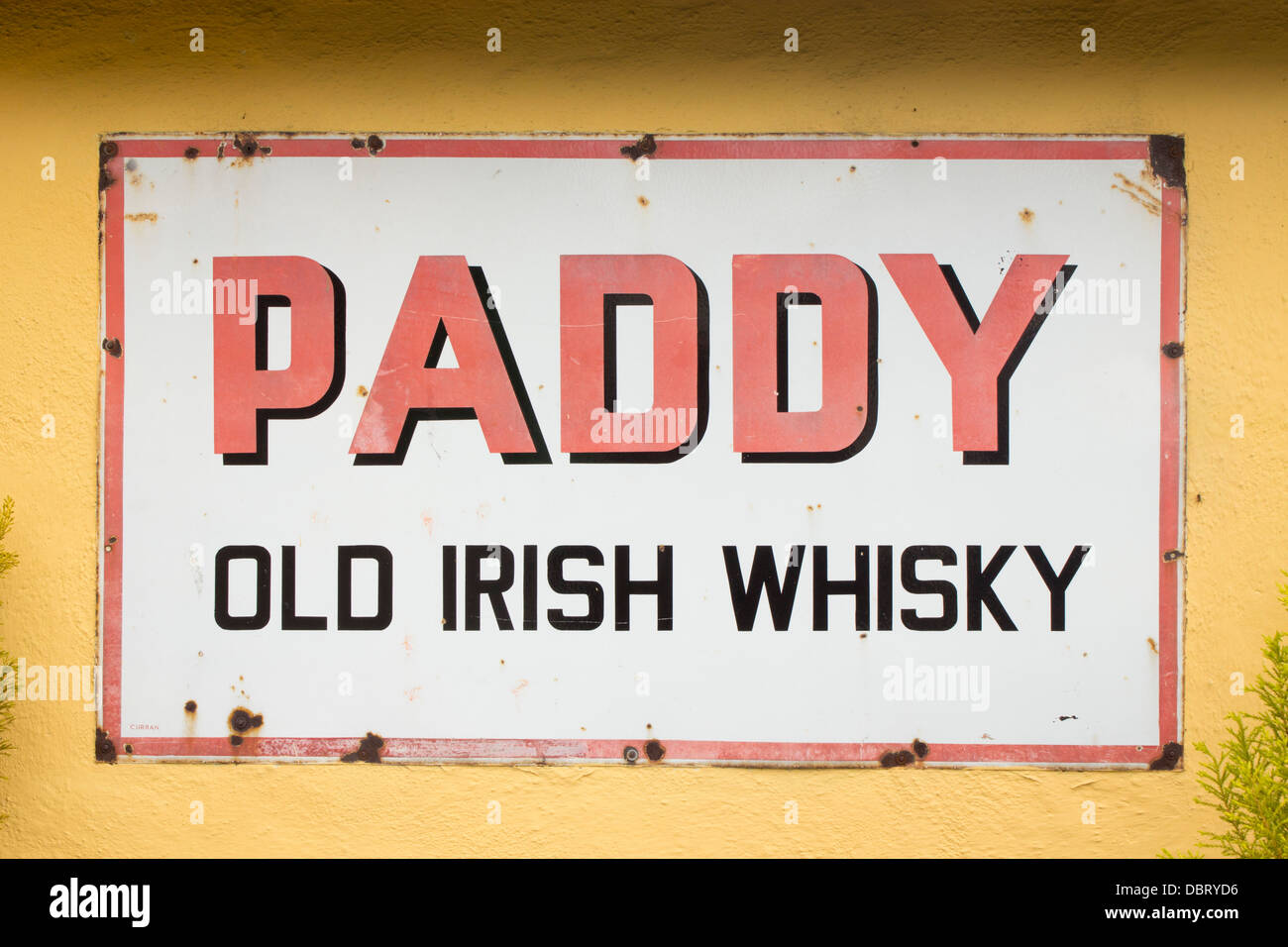 Paddy Old Irish Whisky sign on outside wall of pub Westport County Mayo Eire Republic of Ireland Stock Photo