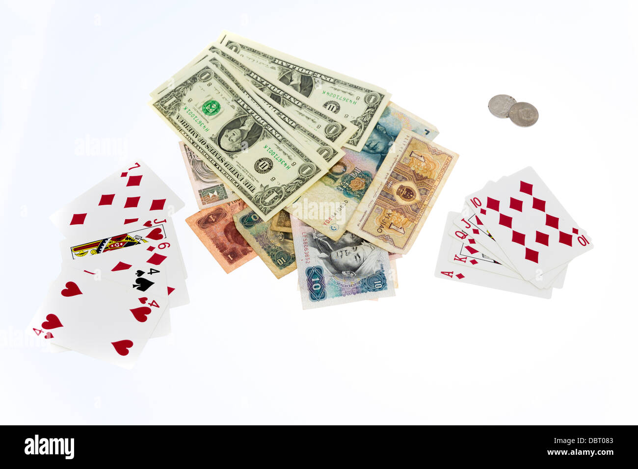 Chinese and US currency and playing cards Stock Photo