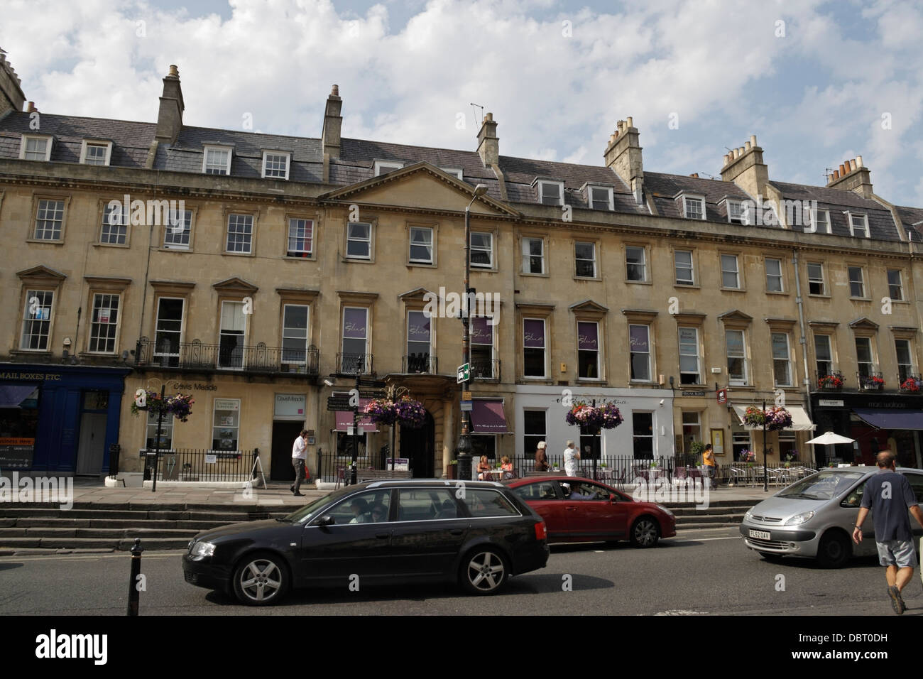 Row of Georgian Buildings Bath city centre England. English townhouses George Street Grade II  listed building part of the conservation area Stock Photo