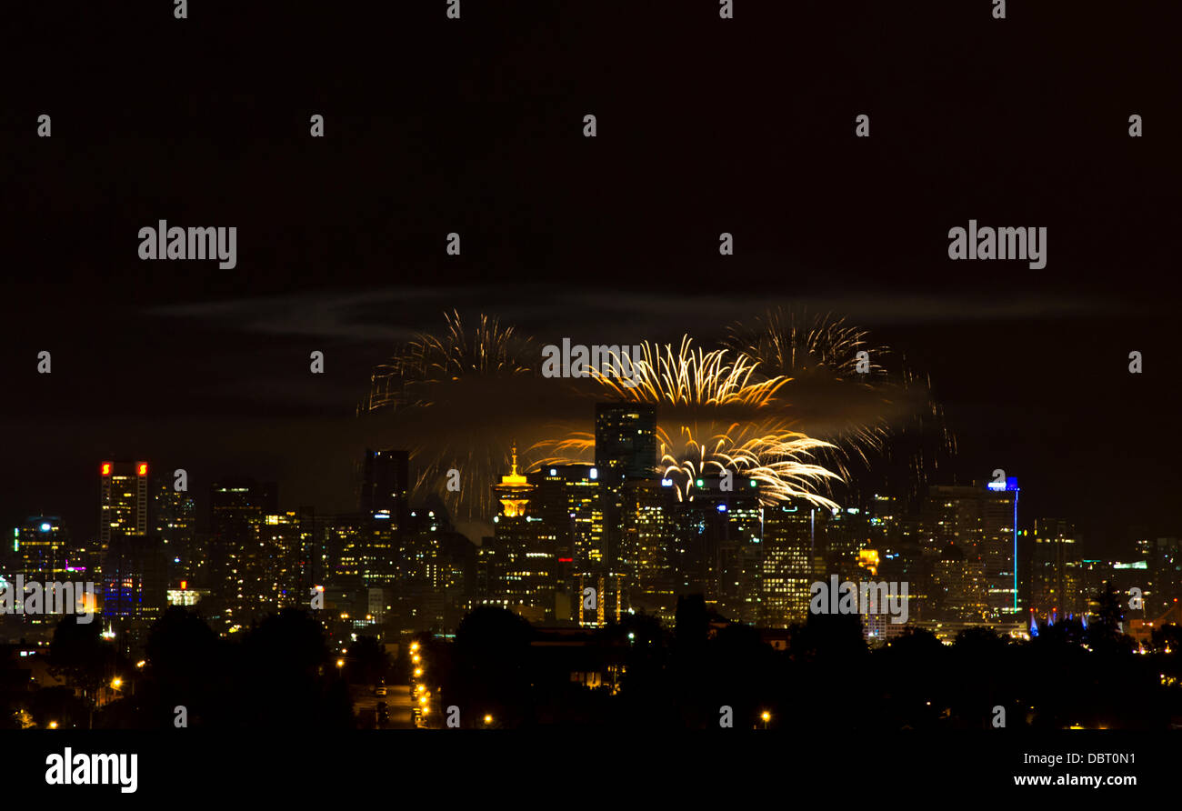 VANCOUVER, CANADA, 3rd August, 2013. Fireworks light the skies beyond downtown Vancouver at the third installment of the Honda Celebration of Light fireworks competition. Credit: Maria Janicki / Alamy Stock Photo