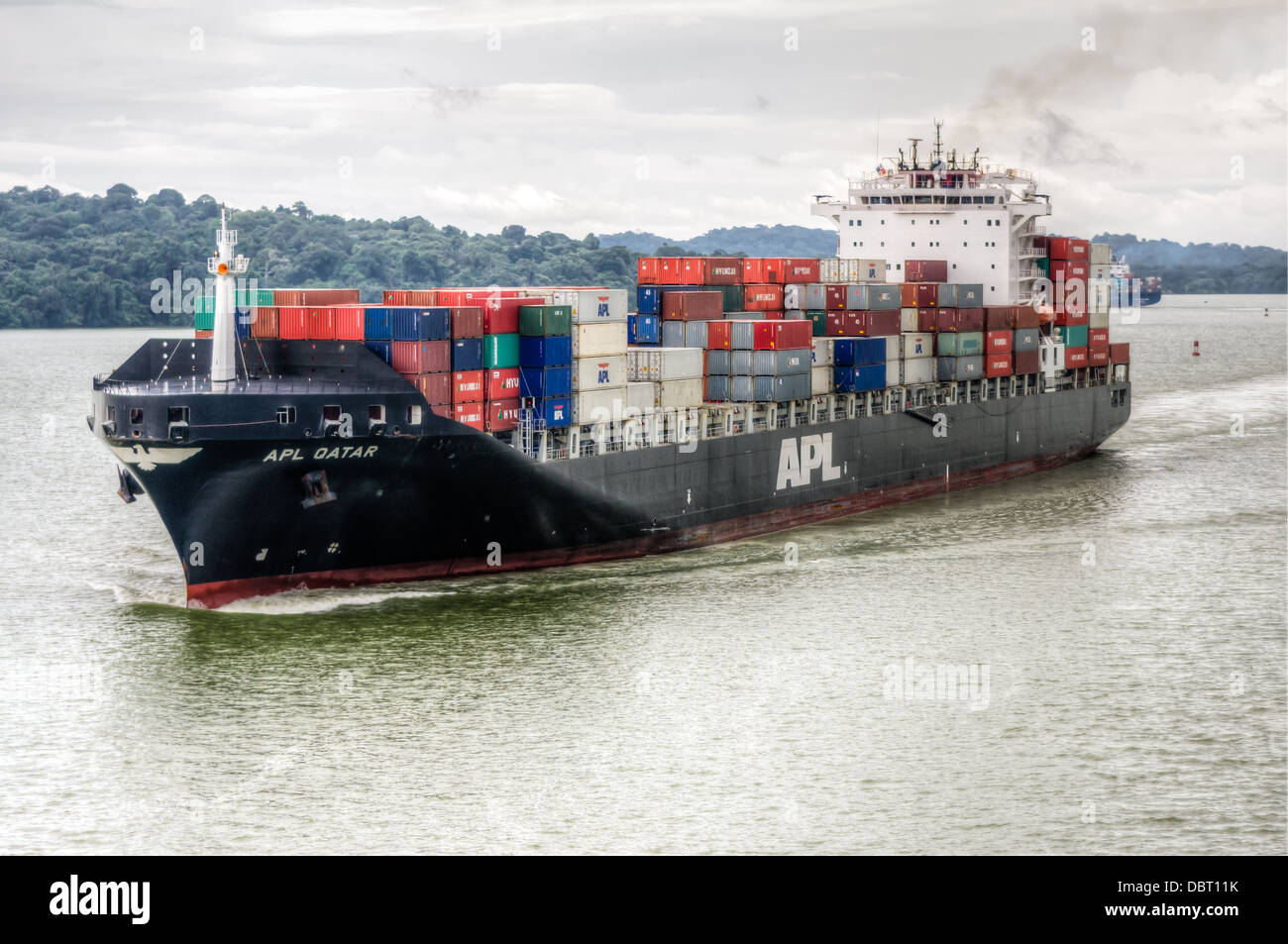 Panama Canal, Panama Cargo ship APL Qatar transits the Panama Canal Stock Photo