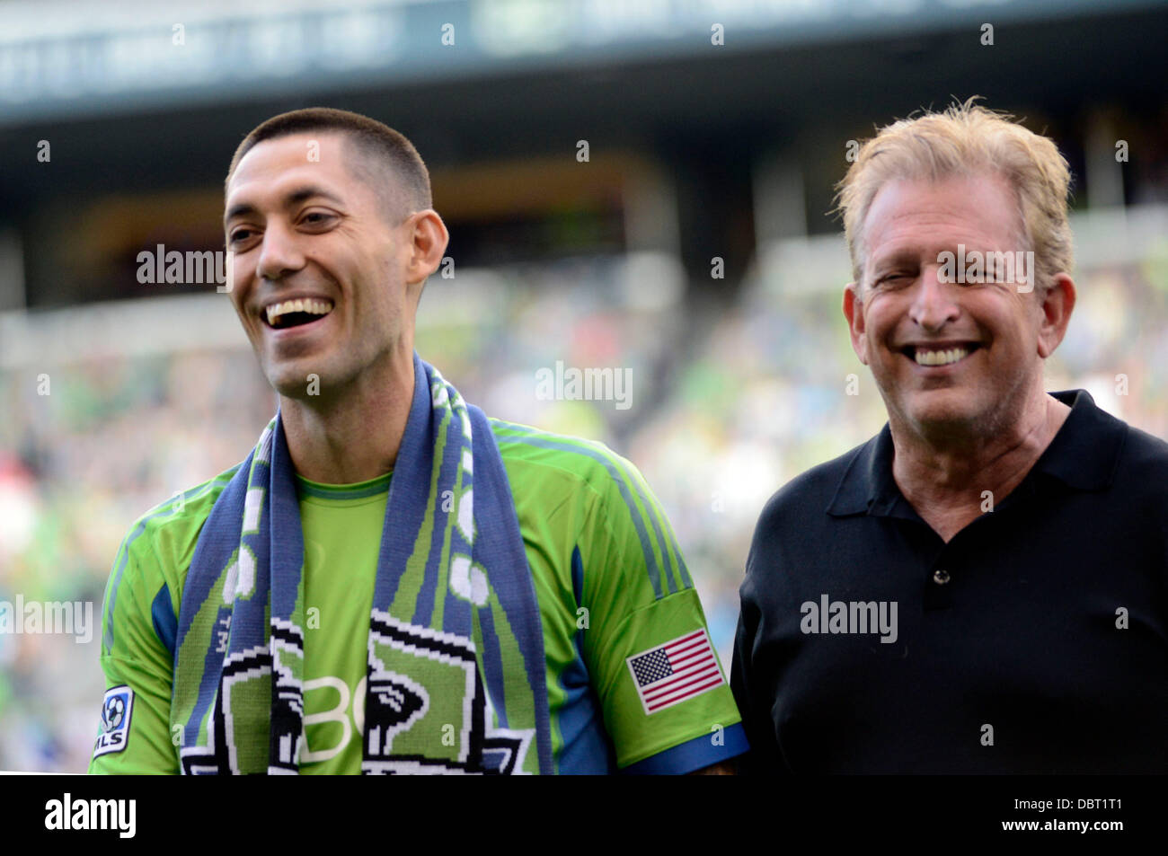 August 3, 2013. Seattle Sounders FC Majority owner Joe Roth introduces newly signed Sounder Clint Dempsey before a game against FC Dallas at CenturyLink Field in Seattle, WA. Seattle Sounders FC defeats FC Dallas 3 - 0.George Holland / Cal Sport Media. Stock Photo