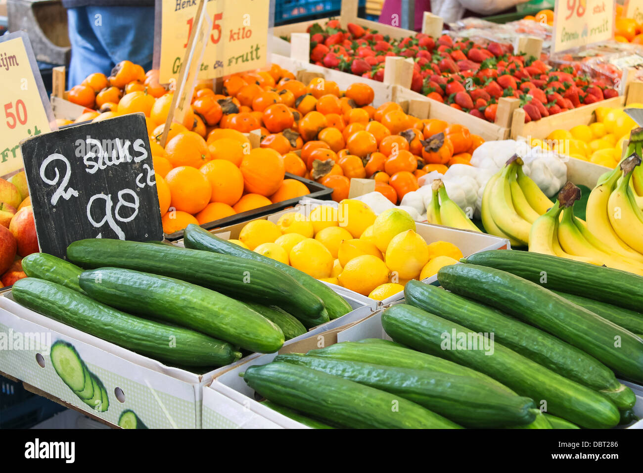 Fruit and vegetables at a market stall Stock Photo - Alamy