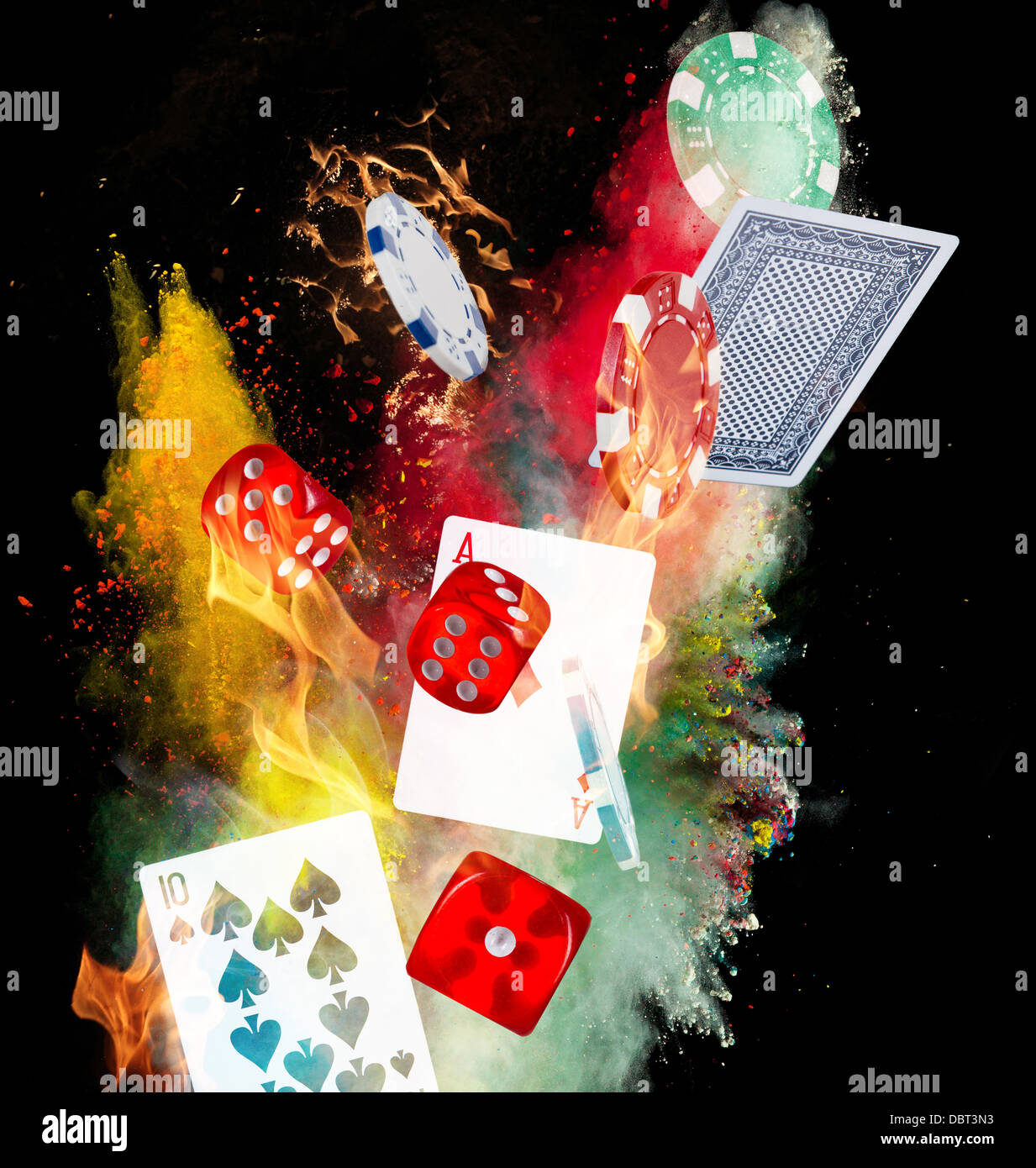 Poker chips, cubes and playing cards in motion Stock Photo
