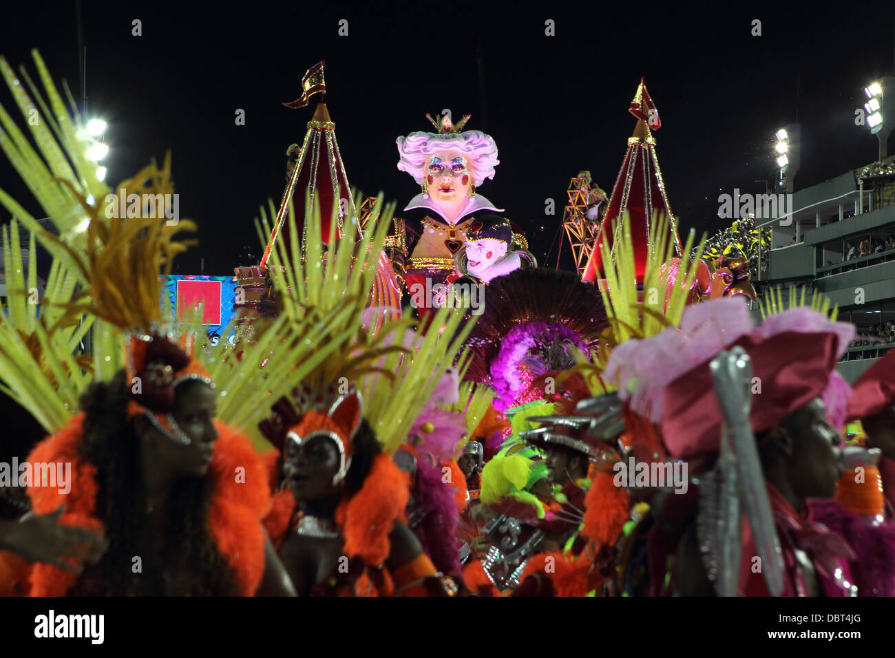 A float of a giant queen lead by dancers on the Sambodromo during Carnival, Rio de Janeiro, Brazil on Monday, 11 February 2013. Stock Photo