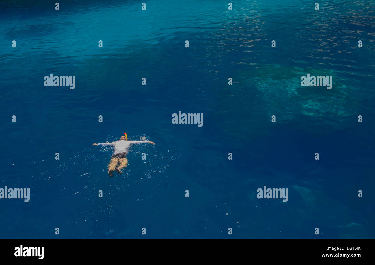 Snorkeler and tropical island hi-res stock photography and images - Alamy