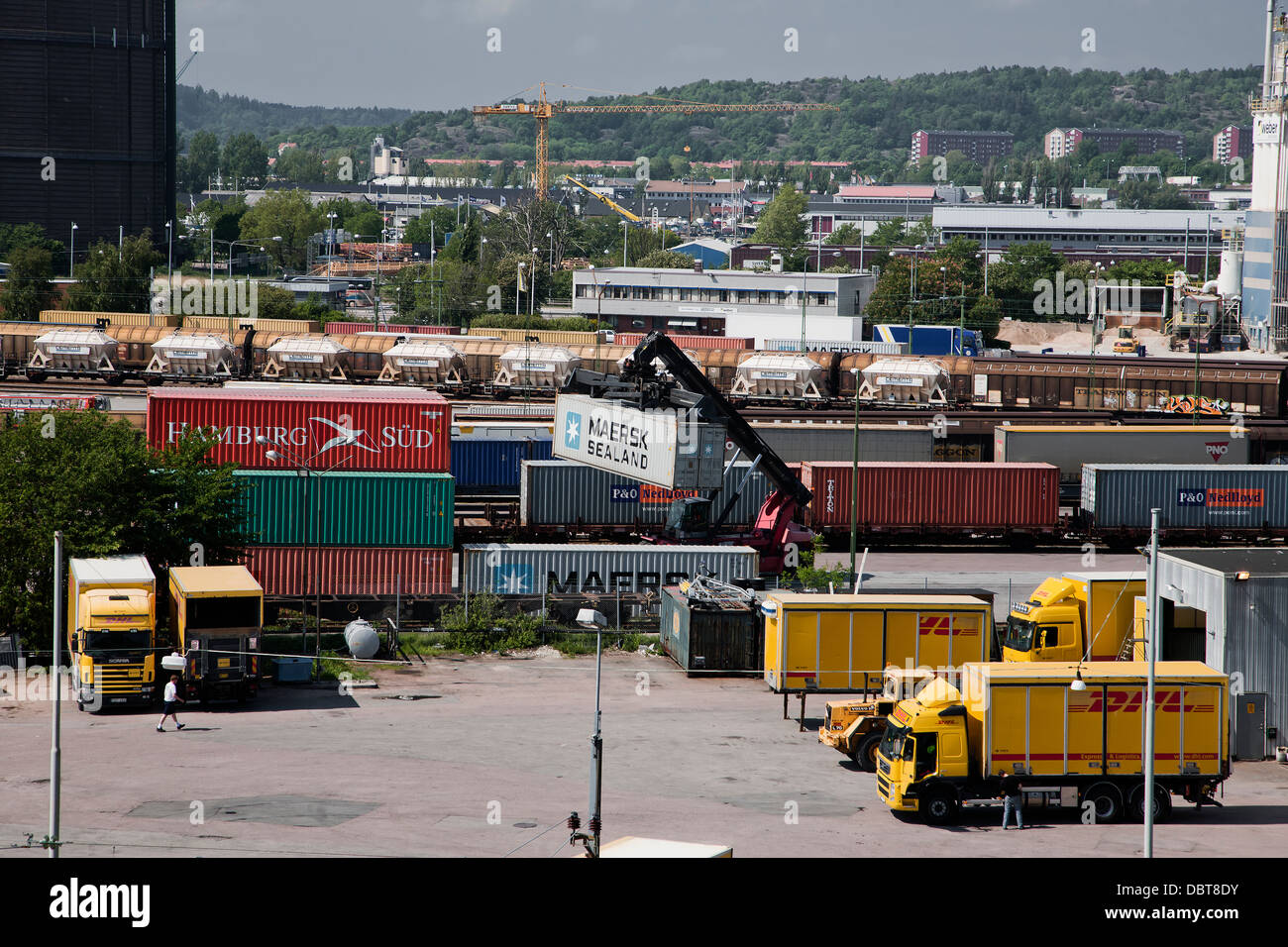 Freight train and trucks Stock Photo