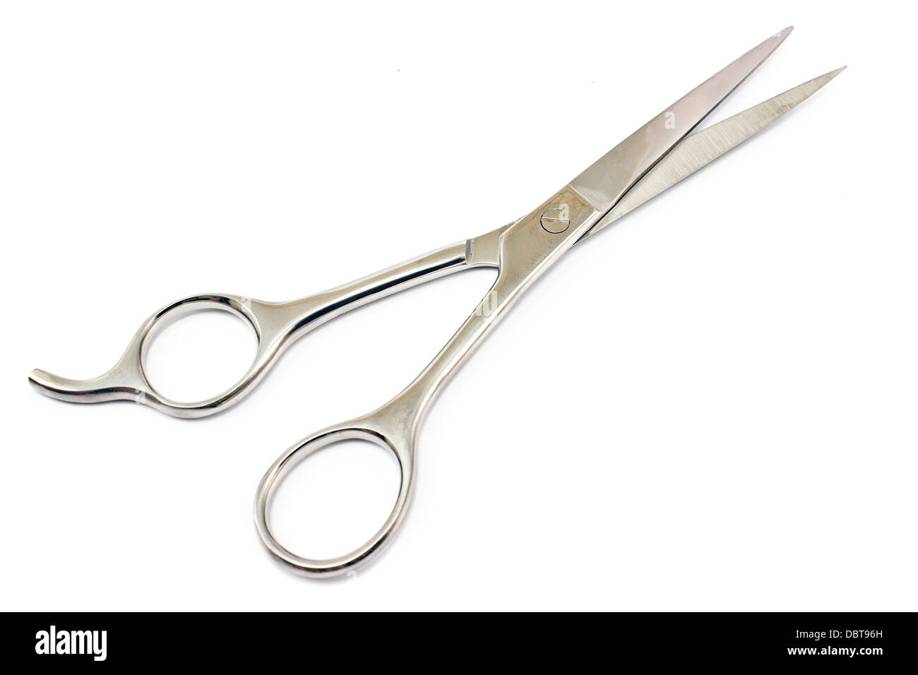 Professional haircutting scissors isolated on white. Stock Photo