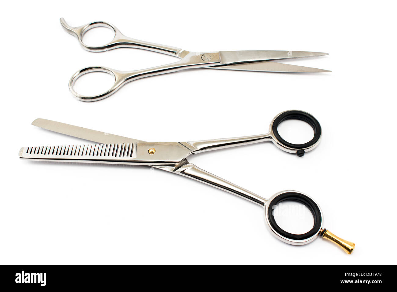 Two professional haircutting scissors isolated on white Stock Photo