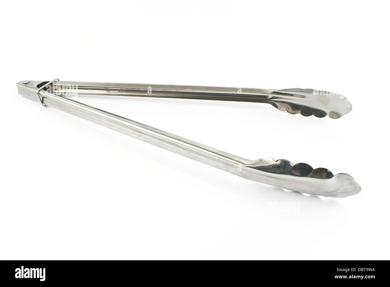 Serving kitchen tongs isolated on a white Stock Photo