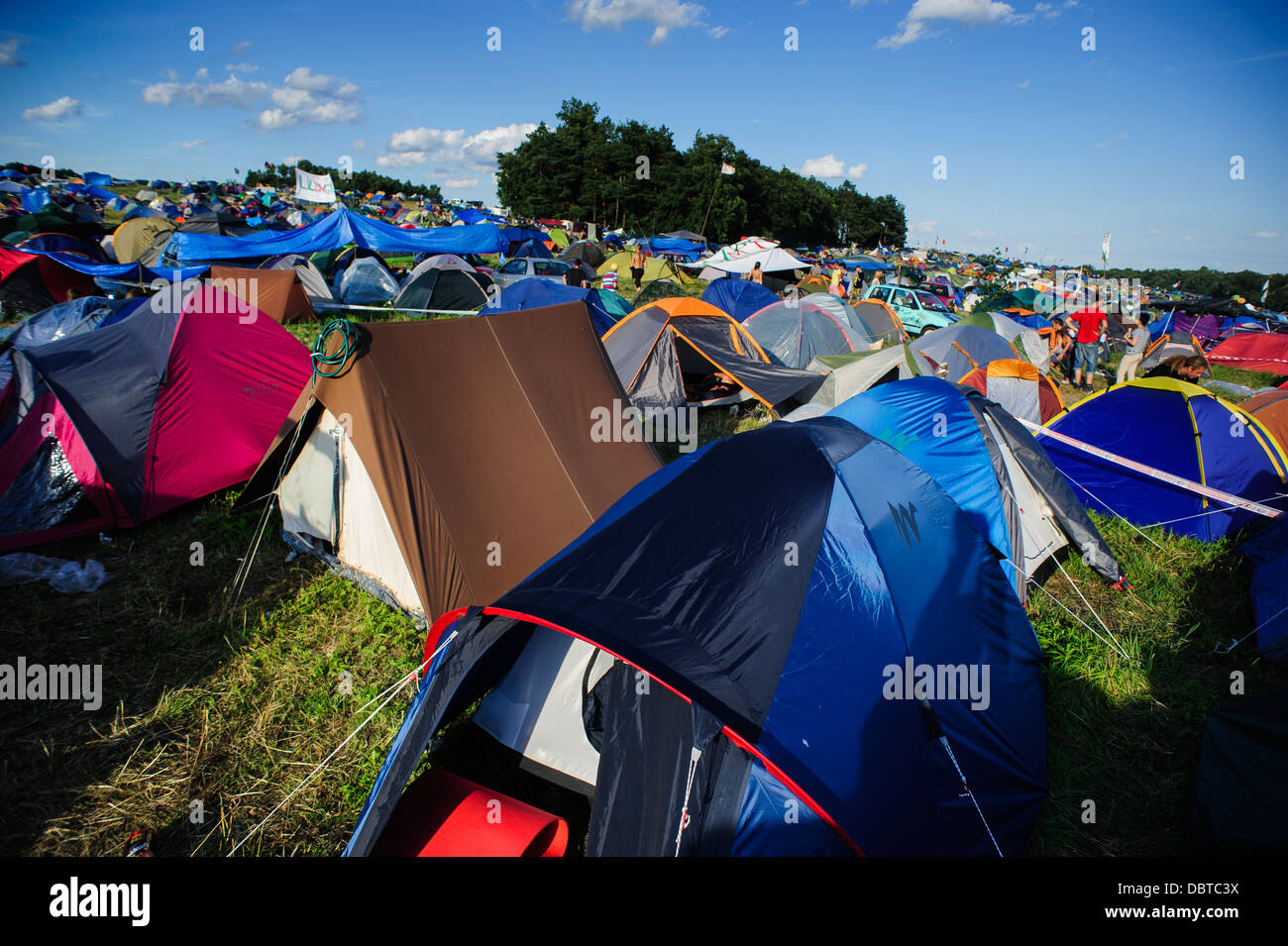 View of one of the capsites at the Przystanek Woodstock - Europe's largest open air Music festival in Kostrzyn, Poland. Stock Photo