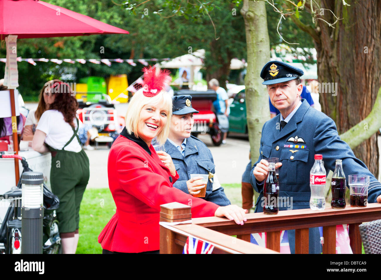 Woodhall Spa. 4th August, 2013. Woodhall Spa 1940's weekend 4/08/2013 Lincolnshire Village UK England. Local residents dressed in traditional 1940's war time outfits of the era along with war vehicles and cars Credit:  Paul Thompson Live News/Alamy Live News Stock Photo