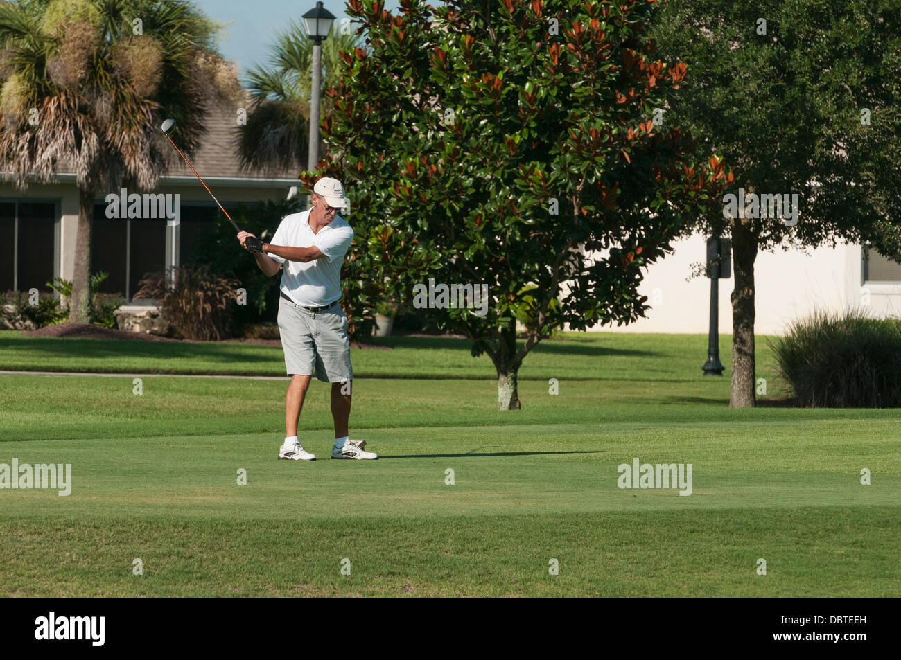 Residents golfing on the Amelia course at the Mallory Hill Country Club in The Villages, Florida. Stock Photo