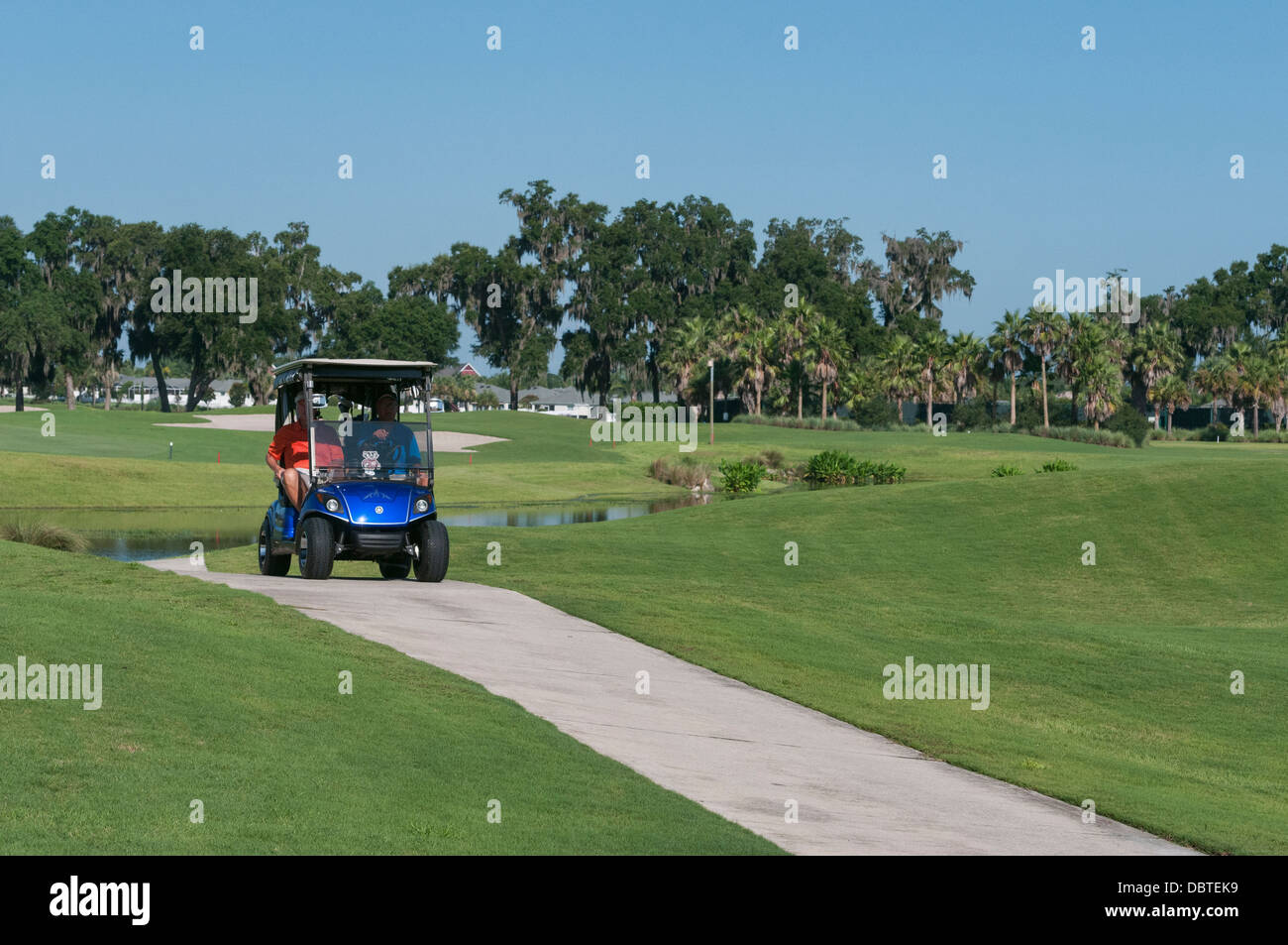 Golf Cart traveling on the grounds of the Mallory Hill Country Club in