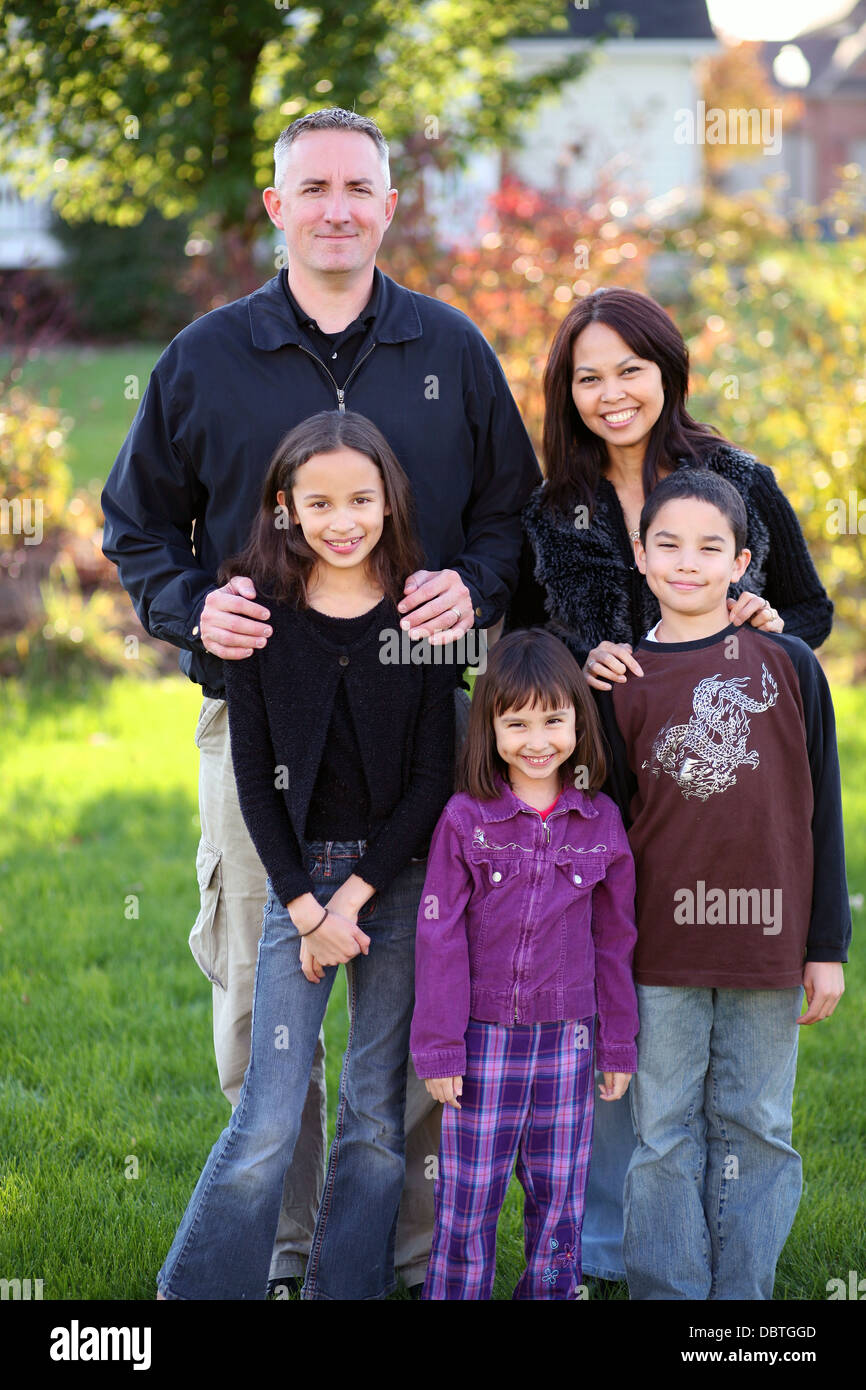 Family of 5 made of diverse nationalities outdoors Stock Photo Alamy