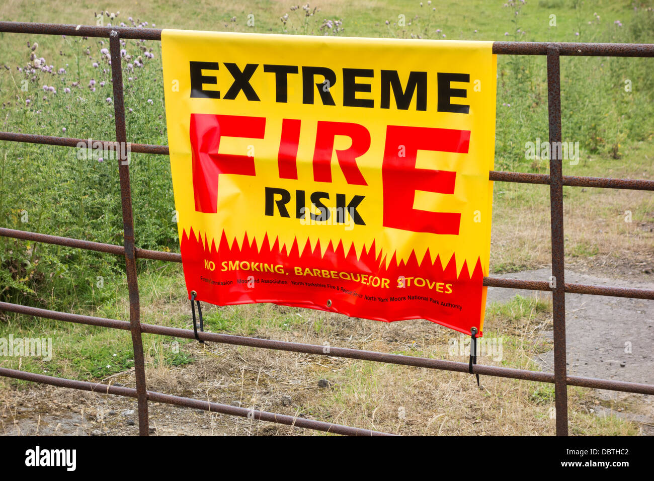 Extreme Fire Risk sign on gate in North York Moors National Park, England, UK Stock Photo