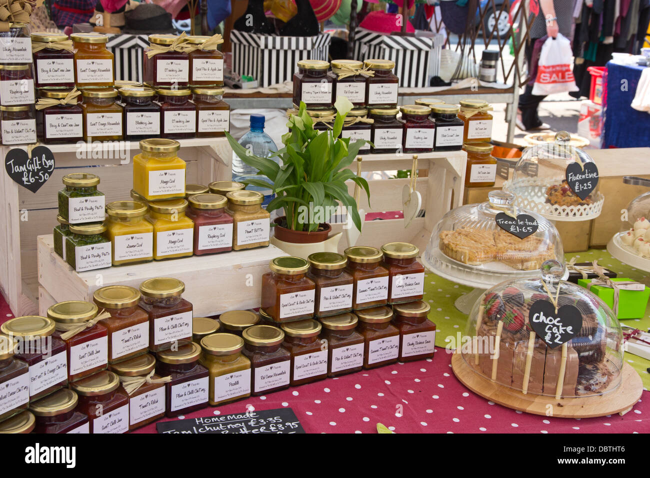 Preserves, relishes and cakes for sale on market stall, Ludlow Stock Photo