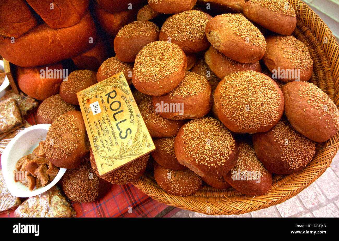 Organic bread rolls on sale at a market in Totnes, Devon, UK. Stock Photo